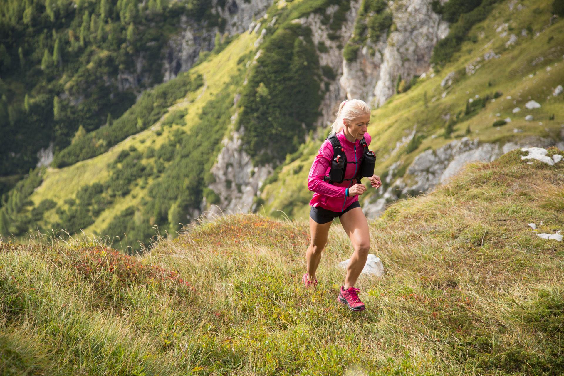 Woman running up hill 638891568.jpeg