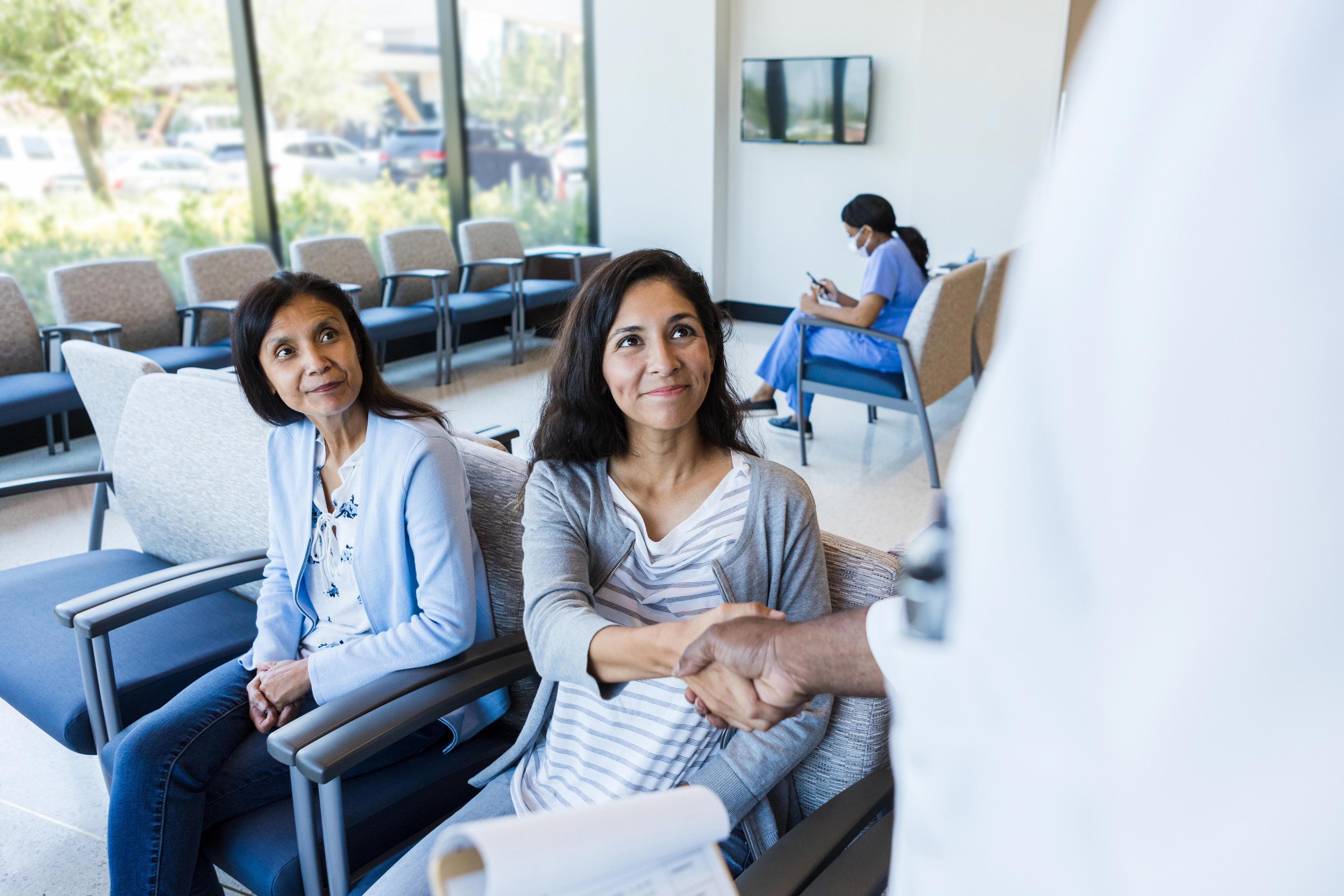 Patient greeted by doctor