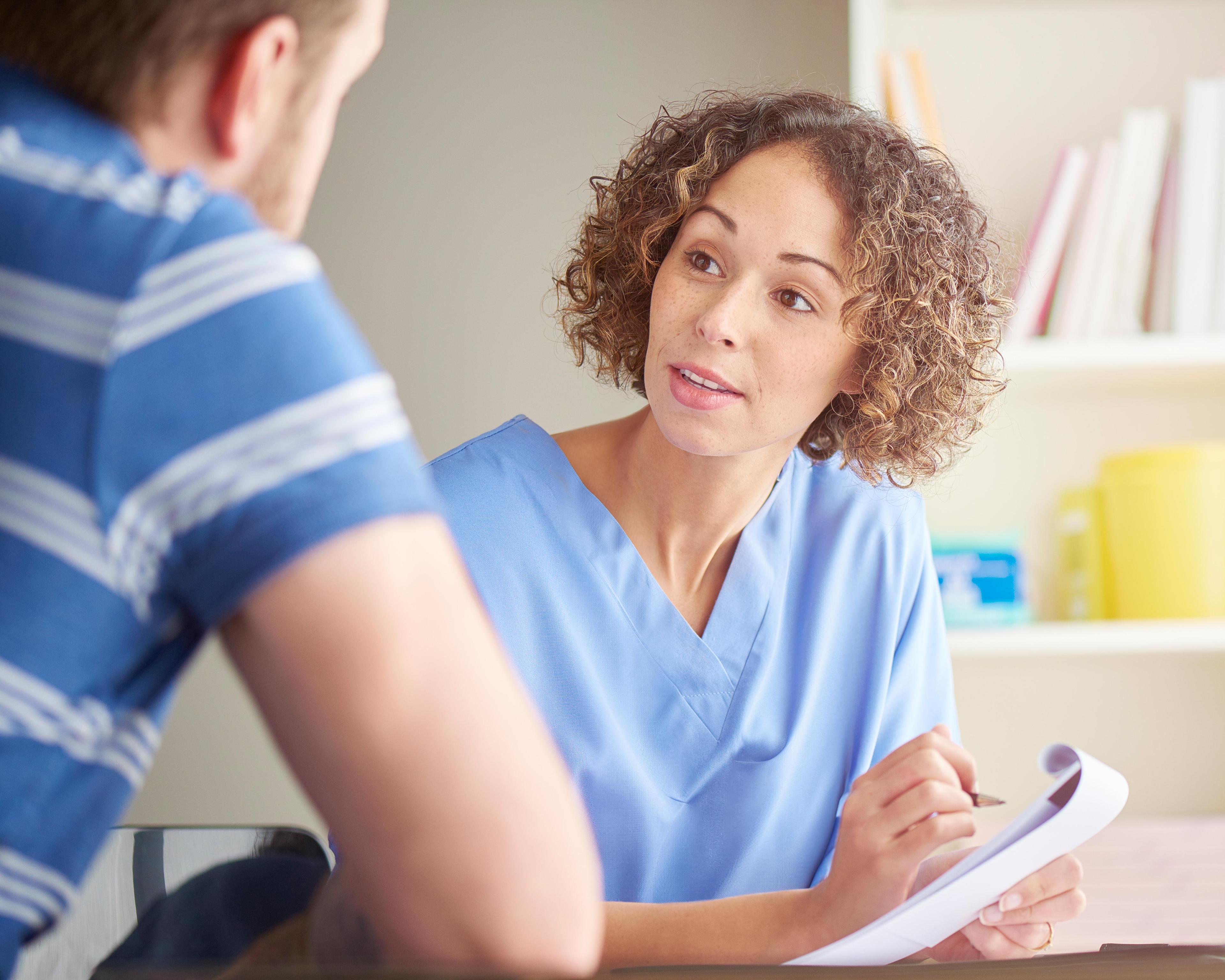 Female doctor with patient