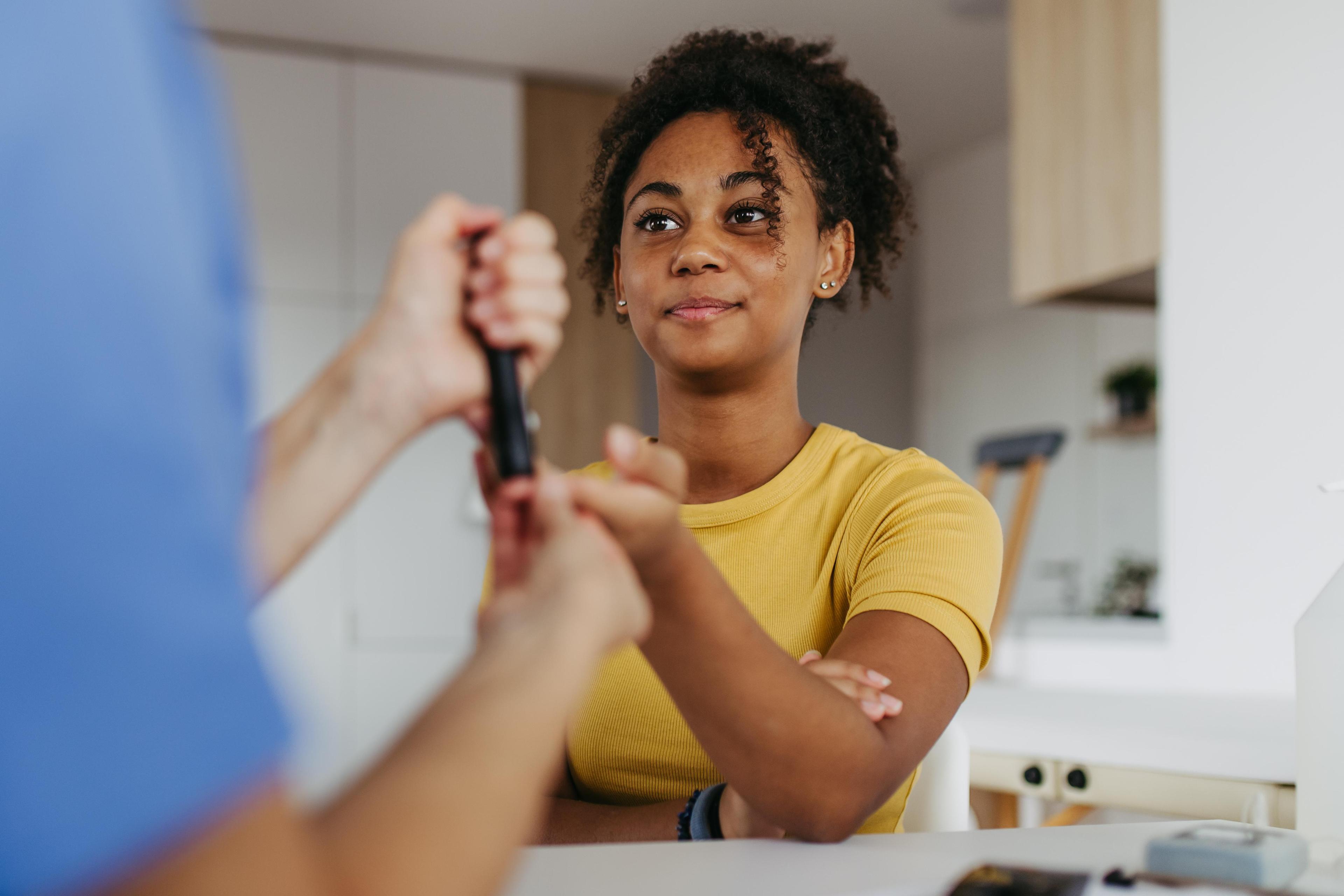 Nurse collecting blood sample