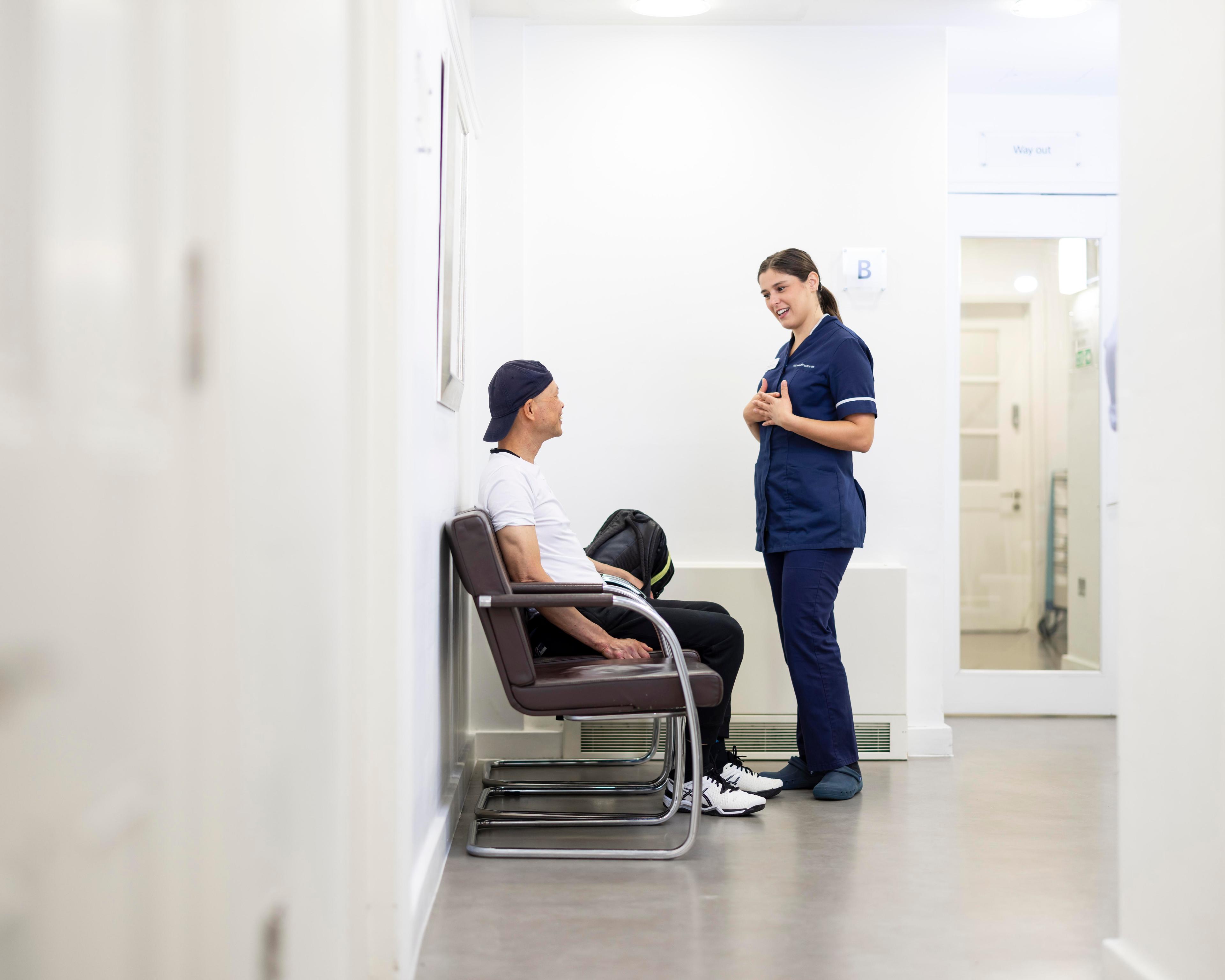 Nurse and patient in reception